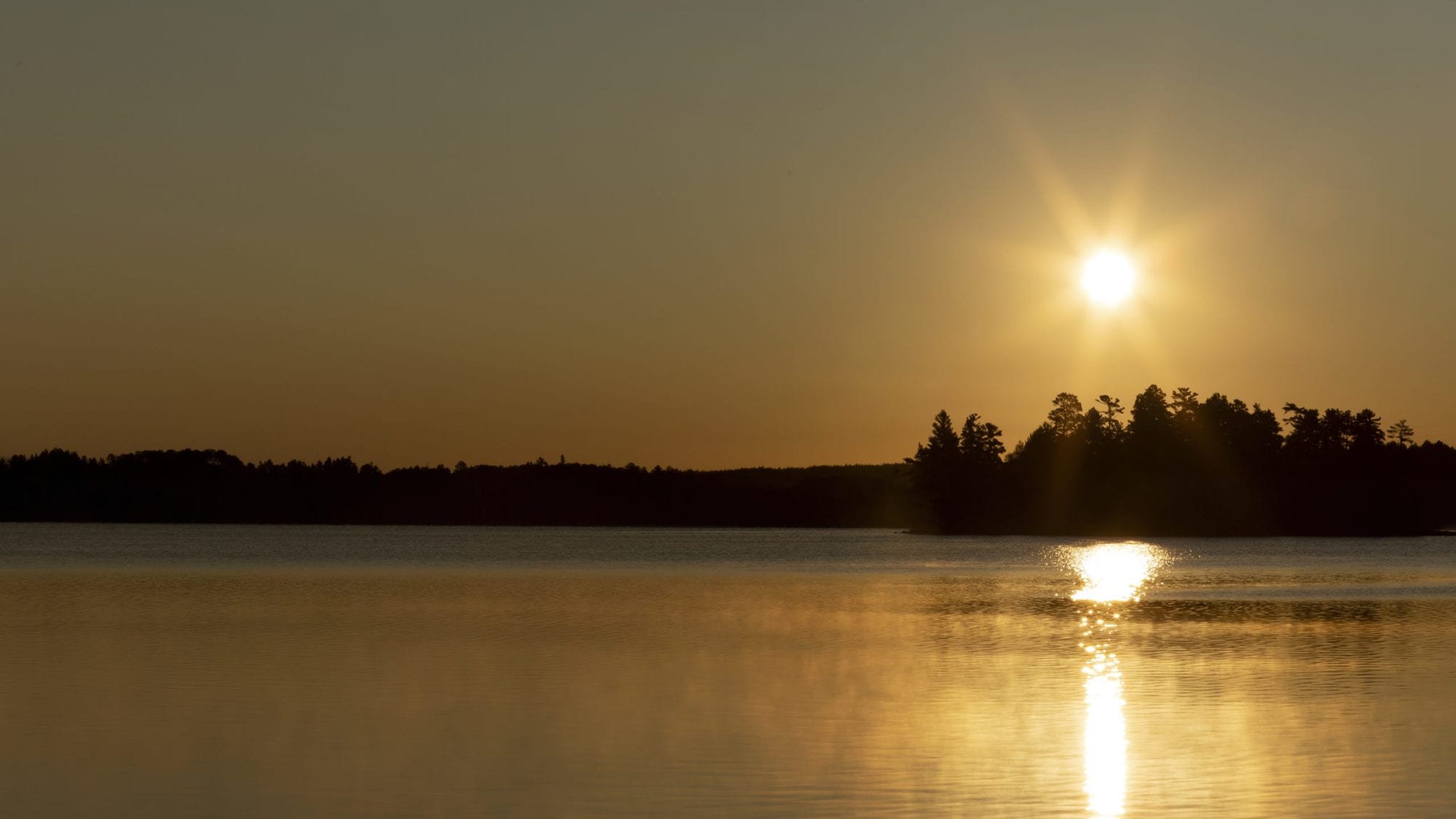 Sunrise over lake in Minnesota